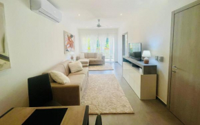 Apartment in Plaza Sabrina - Comfort, Style And Steps from the Sea